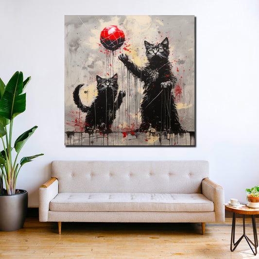 Wandbild abstrakt zwei schwarze Katzen spielen mit rotem Ball