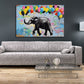 Elefant mit bunten Luftballons auf Ziegelwand Wandbild