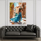 Frau in blauem Kleid auf Vespa in mediterraner Sommergasse Wandbild