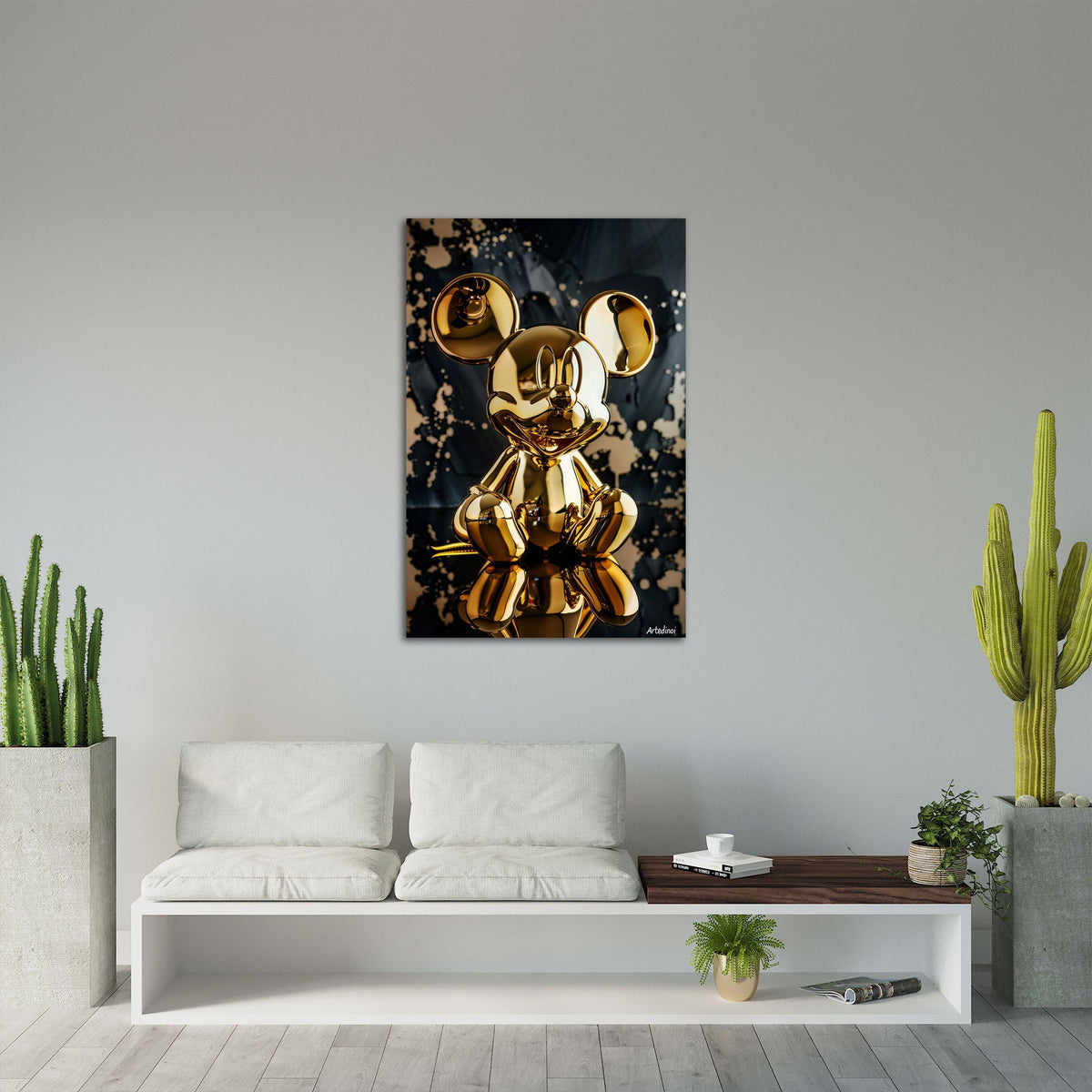 Pop Art Wandbild in Gold und Schwarz an einer Wohnraumwand