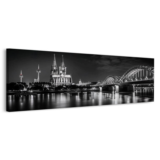 Köln bei Nacht mit Dom und Brücke am Rhein Panorama Wandbild